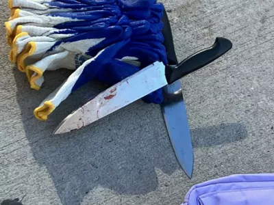 A bloody knife recovered at the scene lies on pavement after a suspect was arrested in a deadly stabbing attack in the Manhattan borough of New York City, U.S. November 18, 2024. NYPD News/Handout via REUTERS. THIS IMAGE HAS BEEN SUPPLIED BY A THIRD PARTY