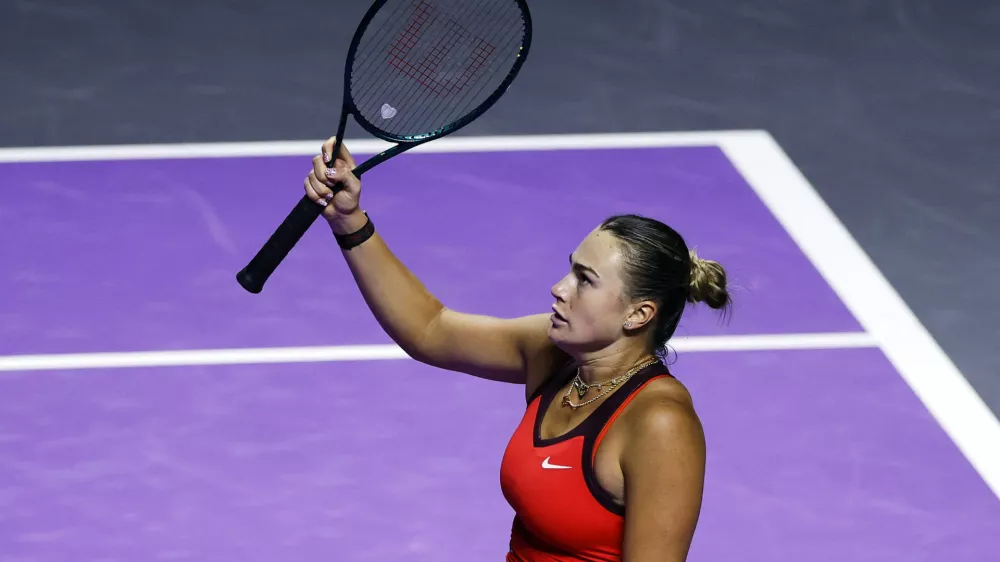 Tennis - WTA Finals - Riyadh - King Saud University Indoor Arena, Riyadh, Saudi Arabia - November 4, 2025 Belarus' Aryna Sabalenka celebrates winning her group stage match against Jessica Pegula of the U.S. REUTERS/Stephanie Lecocq