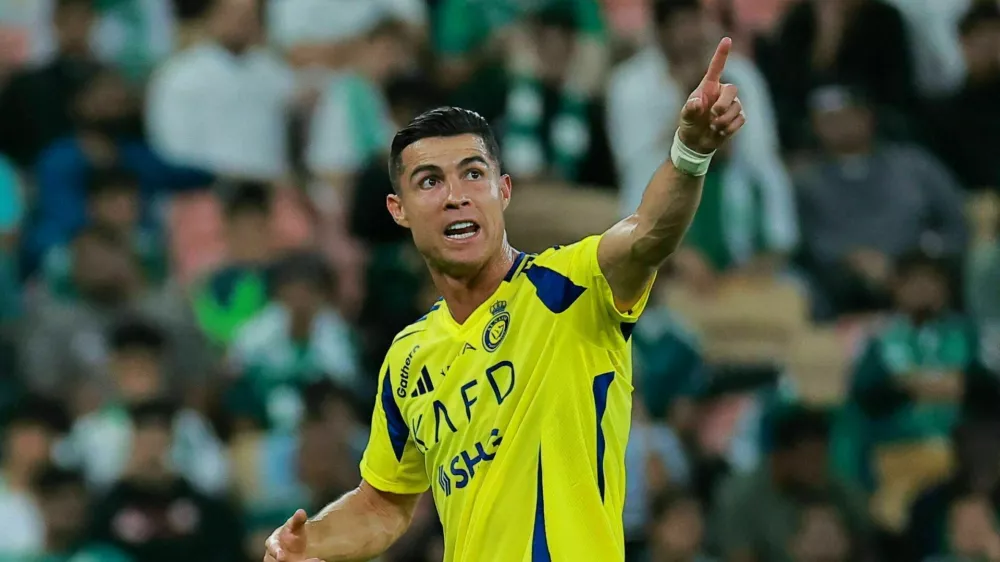 Soccer Football - Saudi Pro League - Al Ahli v Al Nassr - King Abdullah Sports City, Jeddah, Saudi Arabia - February 13, 2025 Al Nassr's Cristiano Ronaldo reacts after being substituted REUTERS/Stringer
