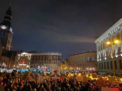 06 November 2025, Lithuania, Riga: People hold placards during a protest on Cathedral Square in the Latvian capital against a possible withdrawal of the Baltic EU country from the so-called Istanbul Convention. Photo: Alexander Welscher/dpa