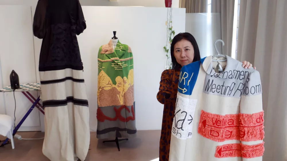 Oblačila, ki se zlijejo z Ljubljano