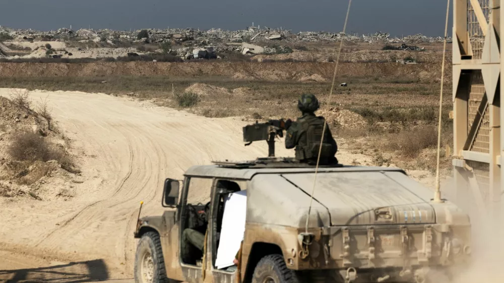 Israeli soldiers enter the Gaza Strip in a military vehicle from at the Israel-Gaza border, November 5, 2025. REUTERS/Nir Elias  EDITOR'S NOTE: REUTERS PHOTOGRAPHS WERE REVIEWED BY THE IDF AS PART OF THE CONDITIONS OF THE EMBED. SIX PHOTOS WERE REMOVED BY REUTERS UPON IDF REQUEST, CITING SECURITY CONCERNS. ALL SIX PHOTOS WERE OF AN IDF OUTPOST.