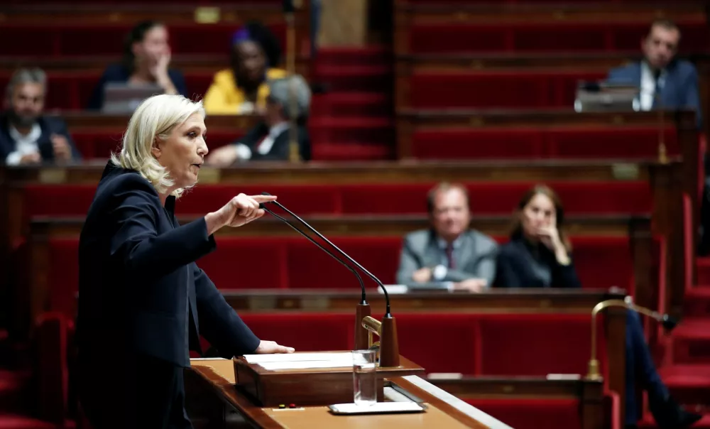 Marine Le Pen, member of parliament and leader of French far-right National Rally (Rassemblement National) party, delivers a speech during a debate on migration at the National Assembly in Paris, France, October 7, 2019. REUTERS/Benoit Tessier - RC1C3D8512E0