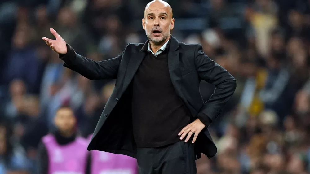 05 November 2025, United Kingdom, Manchester: Manchester City manager Pep Guardiola gestures on the touchline during the UEFA Champions League soccer match between Manchester City and Borussia Dortmund at the Etihad Stadium. Photo: Martin Rickett/PA Wire/dpa