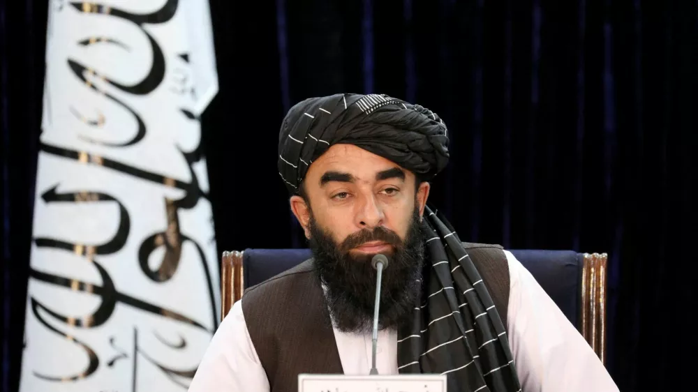 FILE PHOTO: Taliban spokesman Zabihullah Mujahid speaks during a news conference in Kabul, Afghanistan November 10, 2021. REUTERS/Ali Khara/File Photo