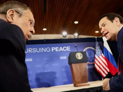 FILE PHOTO: Russian Foreign Minister Sergei Lavrov and U.S. Secretary of State Marco Rubio talk as they attend a press conference held by U.S. President Donald Trump and Russian President Vladimir Putin following their meeting to negotiate an end to the war in Ukraine, at Joint Base Elmendorf-Richardson, in Anchorage, Alaska, U.S., August 15, 2025. REUTERS/Kevin Lamarque/File Photo