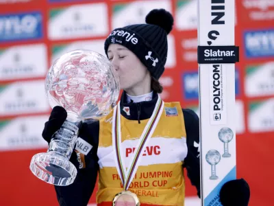 21 March 2025, Finland, Lahti: Slovenia's Nika Prevc celebrates with World Cup overall victory with the Crystal Ball after the women's HS130 ski jumping competition at the FIS Nordic World Cup in Lahti. Photo: Pepe Korteniemi/Lehtikuva/dpa