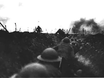 TO MOVE WITH FEATURE BC-MILLENNIUM-CENTURY-WAR - British soldiers wait in the trenches on the Western Front during the First World War as they prepare to make their way 'over the top' to face the enemy. If there is a physical frontier between the 19th and 20th centuries, it surely runs through the haunted trenches and artillery craters scarring the battlefields of World War One.CLH/ - RTRUBNS