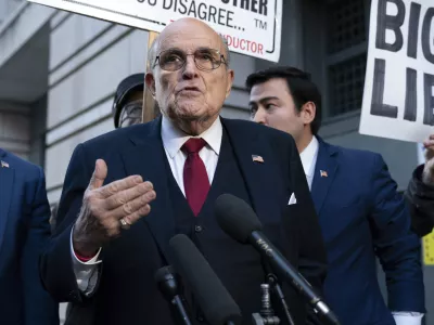 Former New York Mayor Rudy Giuliani speaks during a news conference after his defamation trial outside the federal courthouse in Washington, Friday, Dec. 15, 2023. A jury awarded 8 million in damages on Friday to two former Georgia election workers who sued Rudy Giuliani for defamation over lies he spread about them in 2020 that upended their lives with racist threats and harassment. (AP Photo/Jose Luis Magana)