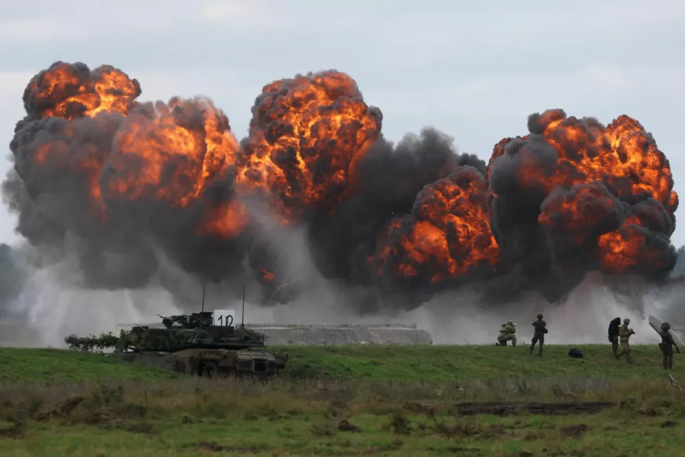 Smoke billows from a blast near Polish Abrams tank as Polish forces with NATO soldiers hold military exercises 'Iron Defender' at a military range in Wierzbiny near Orzysz, Poland, September17, 2025. REUTERS/Kacper Pempel