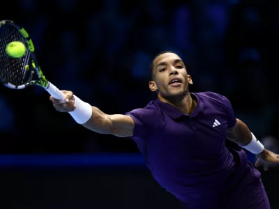 Tennis - ATP Finals - Turin - Palasport Olimpico, Turin, Italy - November 12, 2025 Canada's Felix Auger Aliassime in action during his group stage match against Ben Shelton of the U.S. REUTERS/Guglielmo Mangiapane