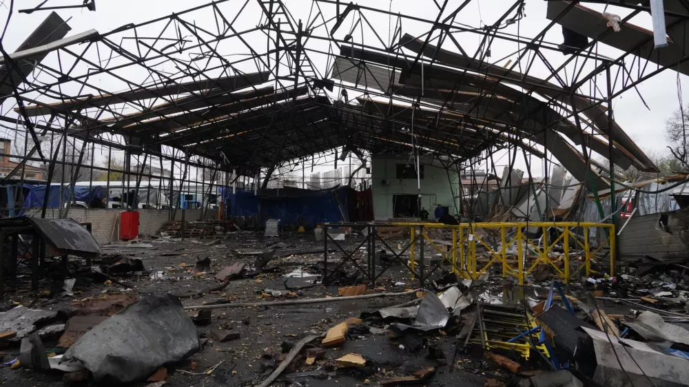 A commercial facility is seen heavily damaged by a Russian strike on Kharkiv, Ukraine, Wednesday, Nov. 12, 2025. (AP Photo/Andrii Marienko)