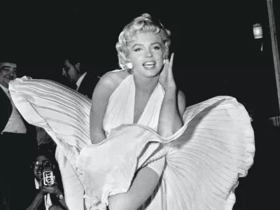 Designer William Travilla created The Seven Year Itch's white dress and he dreamed up the pink and gold gowns from Gentlemen Prefer Blondes &ndash; all famous Monroe getups. Although the designer never paid much heed to his creation (once dismissing it as "that silly little dress") it has paid off, and was sold at a 2011 auction for .6m. The auction resulted from Debbie Reynolds' need to sell off assets to avoid bankruptcy. Those assets included her collection of Old Hollywood memorabilia (that she hoped to eventually house in a museum of her own), among which was Monroe's dress &ndash; which Reynolds said she only paid 0 for in 1971 - Anne T Donahue,Image: 580025776, License: Royalty-free, Restrictions:, Model Release: no / Foto: Profimedia