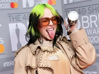 18 February 2020, England, London: American singer Billie Eilish holds the Brit Award for Best International Female during the Brit Awards 2020 at the O2 Arena. Photo: Ian West/PA Wire/dpa