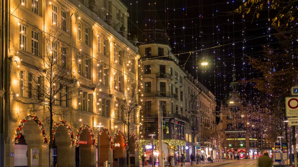 Zruich, Switzerland - January 02.2022: Bahnhof Street in the Zurich city center on the Christmas season with festival illumination.