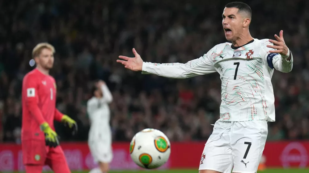 Portugal's Cristiano Ronaldo reacts during a World Cup 2026 group F qualifying soccer match between Ireland and Portugal in Dublin, Thursday, Nov. 13, 2025. (Niall Carson/PA via AP)