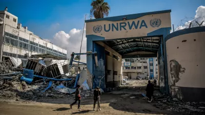 FILED - 10 February 2024, Palestinian Territories, Gaza City: Palestinians examine the damage in front of the United Nations Relief and Works Agency for Palestine Refugees (UNRWA) buildings in Gaza City. Photo: Omar Ishaq/dpa