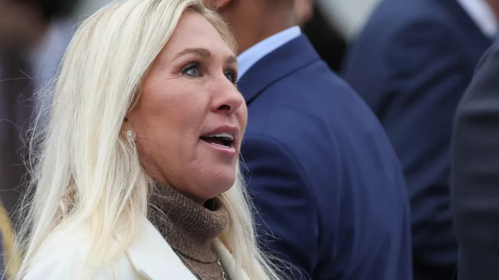 FILE PHOTO: U.S. Rep. Marjorie Taylor Greene (R-GA) looks on, ahead of President Donald Trump delivering remarks on tariffs, in the Rose Garden at the White House in Washington, D.C., U.S., April 2, 2025. REUTERS/Leah Millis/File Photo