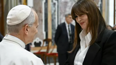 15 November 2025, Vatican, Vatican City: Pope Leo XIV greets Italian actress Monica Bellucci during a special audience with the World of Cinema at the Apostolic Palace. The Pope received a delegation of international actors, filmmakers and scriptwriters to deepen the dialogue between the Church and the world of cinema. Photo: -/IPA via ZUMA Press/dpa