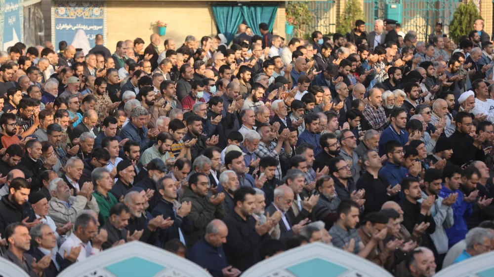 People pray for rain following a drought crisis at Imamzadeh Saleh shrine in Tehran, Iran, November 14, 2025. Majid Asgaripour/WANA (West Asia News Agency) via REUTERS ATTENTION EDITORS - THIS PICTURE WAS PROVIDED BY A THIRD PARTY