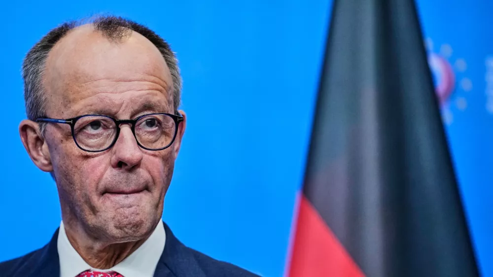 German Chancellor Friedrich Merz attends a news conference during the Summit on European Digital Sovereignty in Berlin, Germany, Tuesday, Nov. 18, 2025. (AP Photo/Ebrahim Noroozi)