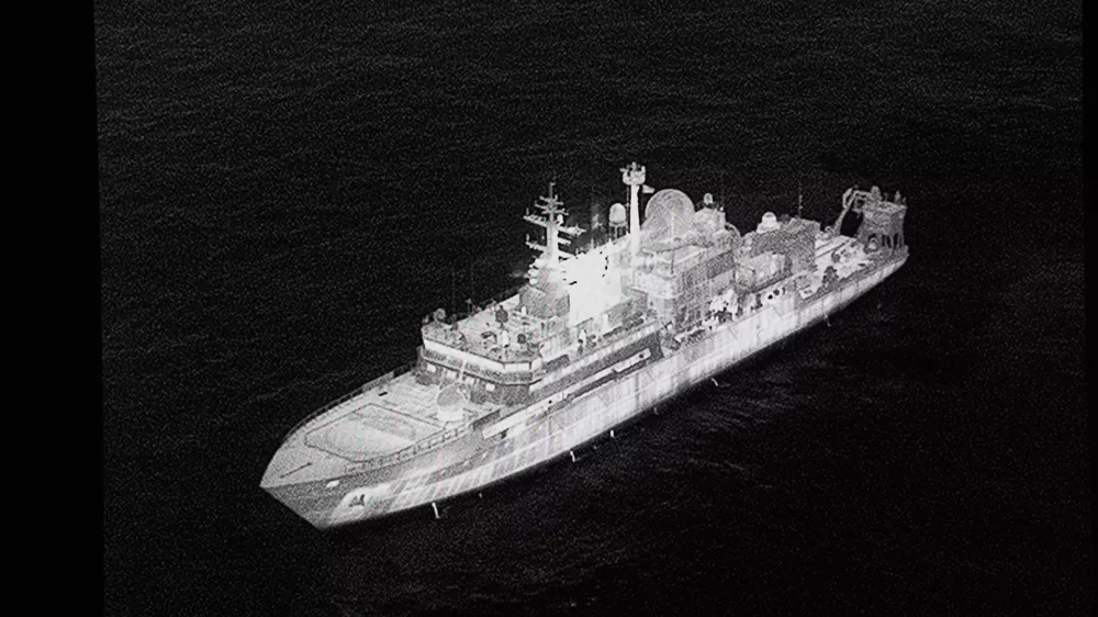 An image of a ship detected off the British Coast on a screen during Defence Secretary John Healey's speech on how the UK's defence industry is delivering growth and national renewal across the UK, at No 9 Downing Street in central London. Picture date: Wednesday November 19, 2025. Stefan Rousseau/Pool via REUTERS