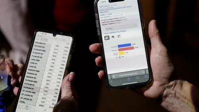 Supporters of Randy Fine, Republican nominee for 2025 Florida's 6th congressional district special election, use their phones to check election results at a watch party, as Florida holds a special election for a U.S. House of Representatives seat vacated by National Security Adviser Michael Waltz, in Ormond Beach, Florida, U.S. April 1, 2025. REUTERS/Octavio Jones