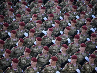 Russian soldiers march toward Red Square to attend a Victory Day military parade in Moscow, Russia, Tuesday, May 9, 2023, marking the 78th anniversary of the end of World War II. (AP Photo/Alexander Zemlianichenko)