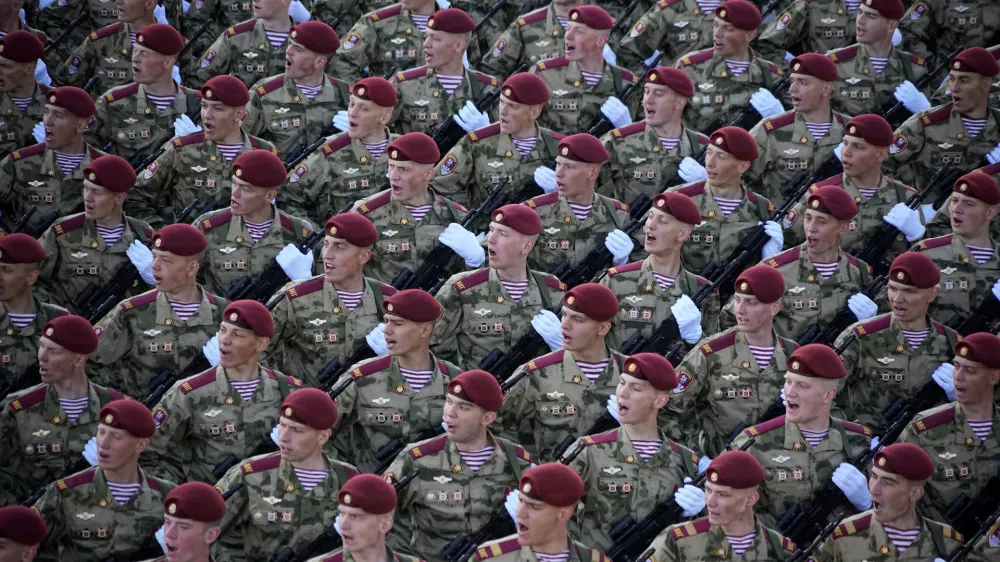 Russian soldiers march toward Red Square to attend a Victory Day military parade in Moscow, Russia, Tuesday, May 9, 2023, marking the 78th anniversary of the end of World War II. (AP Photo/Alexander Zemlianichenko)
