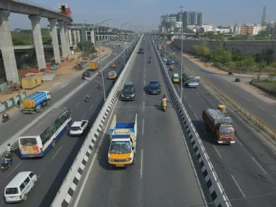 Vehicles drive along a road in Bangalore on March 25, 2021 as India recorded more than 50,000 new coronavirus cases for the first time since November while a new wave of infections took hold a year after one of the world's tightest Covid-19 lockdowns was imposed.,Image: 601049491, License: Rights-managed, Restrictions:, Model Release: no