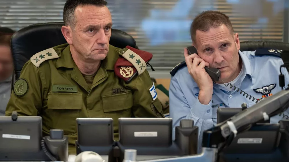 FILED - 26 October 2024, Israel, Tel Aviv: Chief of Israeli General Staff Herzi Halevi (L) and Commander of the Israeli Air Force Tomer Bar sit in an underground command center of the Israeli Air Force at Camp Rabin (Kirya) directing an attack on Iran. Israeli Chief of the General Staff Herzi Halevi has resigned, citing failures by the Israeli military regarding the Hamas-led October 7 attacks, a military spokesman said on Tuesday. Photo: -/IDF/X/dpa - ACHTUNG: Nur zur redaktionellen Verwendung und nur mit vollst&auml;ndiger Nennung des vorstehenden Credits