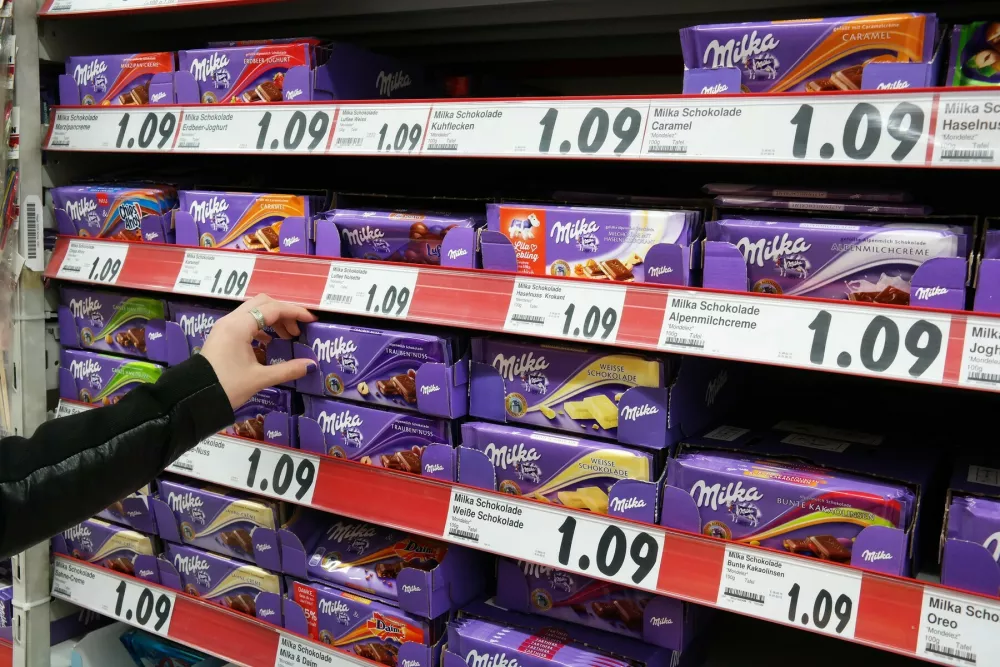GERMANY - FEBRUARY 2015: Shelves with a variety of Milka chocolate bars in a Kaufland supermarket. Milka is a traditional Swiss brand of chocolate confection, since 1990 manufactured by US-american Mondelēz International,Image: 228895946, License: Rights-managed, Restrictions: Usage restrictions: Advertising and promotion,Commercial electronic,Consumer goods,Direct mail and brochures,Indoor display,Internal business usage,Personal use, Model Release: no