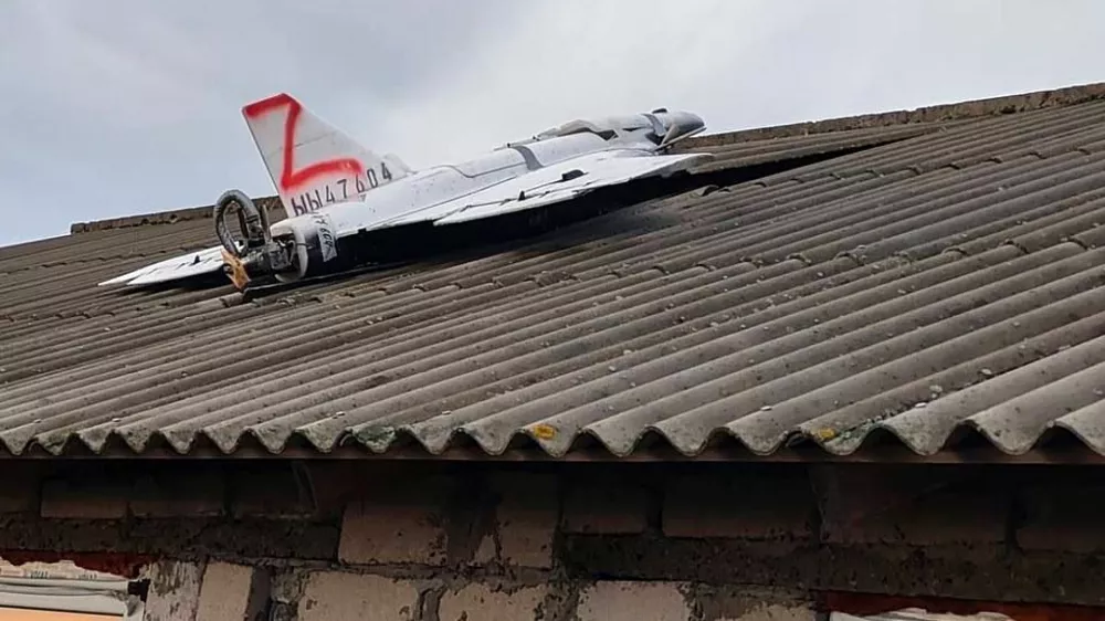 This image released by Moldova's Police on Tuesday, Nov. 25, 2025, shows a drone on the roof of a house in the village of Cuhurestii de Jos, northern Moldova, following Russian air attacks on Ukraine. (Moldova Police via AP)