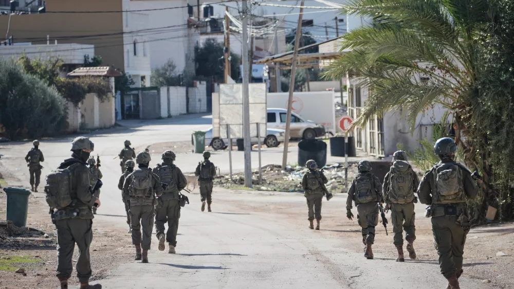 Israeli soldiers are seen during an army raid in the West Bank town of Tubas, Wednesday, Nov. 26, 2025. (AP Photo/Majdi Mohammed)