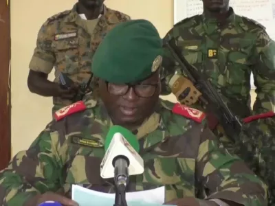 Dinis N'Tchama, military spokesperson, speaks on Wednesday, Nov. 26, 2025 in Bissau, Guinea-Bissau. (TGB Guinea-Bissau via AP)