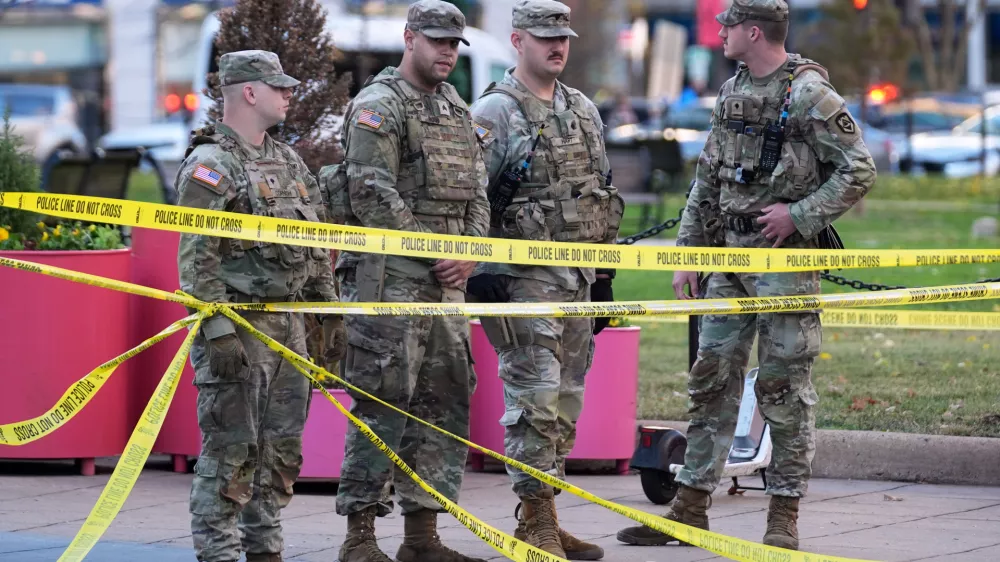 National Guard are seen after reports of two National Guard soldiers shot near the White House in Washington, Wednesday, Nov. 26, 2025. (AP Photo/Evan Vucci)
