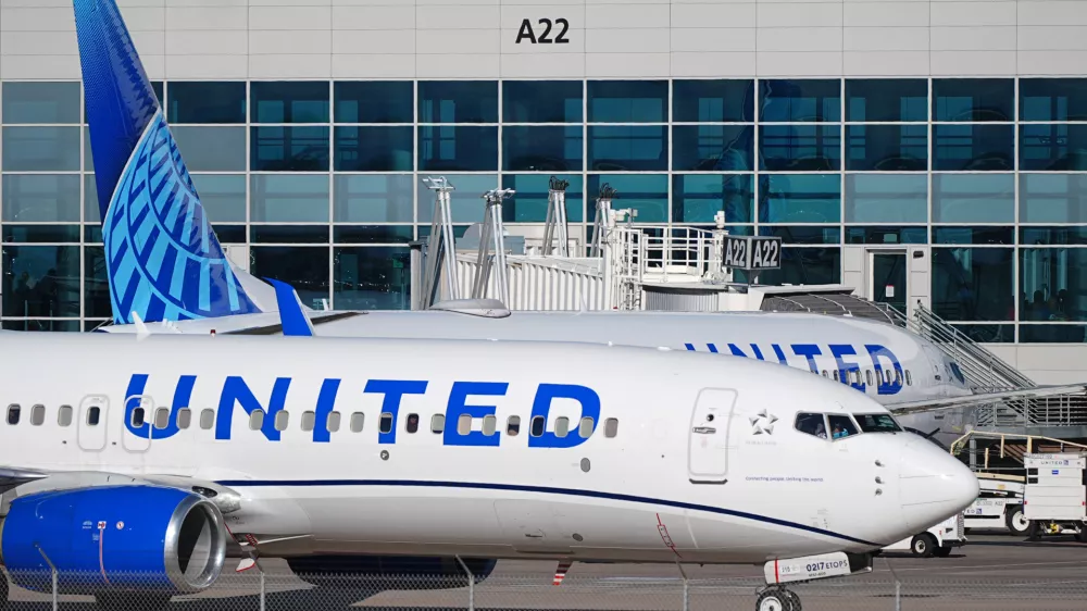 United Airlines jetliners maneuver open gates on the A concourse at Denver International airport Tuesday, Nov. 25, 2025, in Denver. (AP Photo/David Zalubowski)