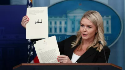 White House Press Secretary Karoline Leavitt shows a signed letter on tariffs from U.S. President Donald Trump to South Korean President Lee Jae Myung during a press briefing at the White House in Washington, D.C., U.S., July 7, 2025. REUTERS/Evelyn Hockstein REFILE - CORRECTING NAME OF LETTER RECIPIENT FROM "JAPANESE PRIME MINISTER SHIGERU ISHIBA" TO "SOUTH KOREAN PRESIDENT LEE JAE MYUNG"   TPX IMAGES OF THE DAY