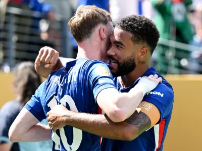 13 July 2025, US, East Rutherford: Chelsea's Cole Palmer (L) and Chelsea's Reece James celebrate after scoring his side's second goal of the game during the FIFA Club World Cup final soccer match between Chelsea FC and Paris Saint-Germain at MetLife Stadium. Photo: Sven Hoppe/dpa