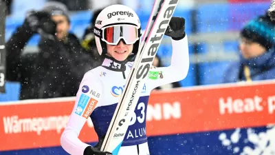 Slovenia's Nika Prevc celebrates winning the Women's Ski Jumping World Cup, large hill, at Lugnet Stadium in Falun, Sweden, Sunday Nov. 30, 2025. (Fredrik Sandberg/TT via AP)