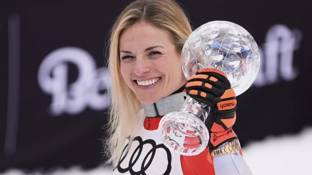 Switzerland's Lara Gut-Behrami holds the first place trophy for women's super-G season champion at the World Cup Finals, Sunday, March 23, 2025, in Sun Valley, Idaho. (AP Photo/John Locher)