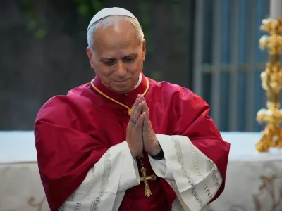 Pope Leo XIV acknowledges the crowd during a gathering with bishops, priests, consecrated persons, and pastoral workers at the Our Lady of Lebanon basilica in Harissa, Lebanon, Monday, Dec. 1, 2025. (AP Photo/Hussein Malla)