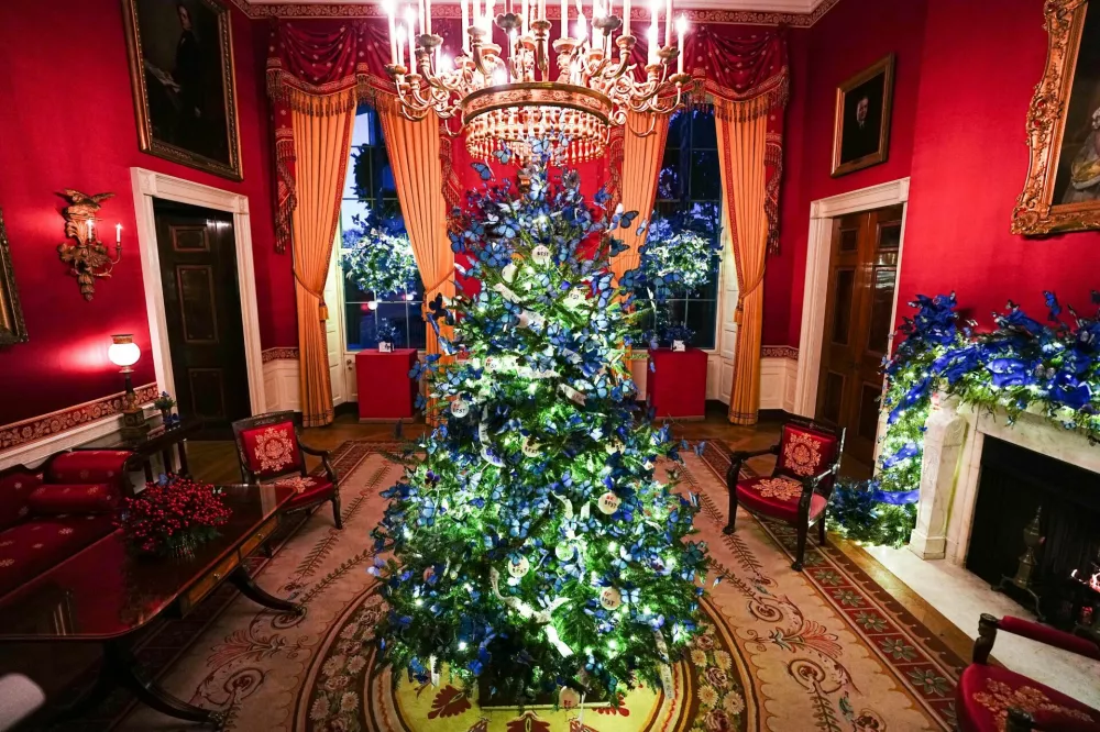 The Red Room of the White House during a media preview of the 2025 holiday decorations at the White House in Washington, U.S., December 1, 2025. REUTERS/Aaron Schwartz
