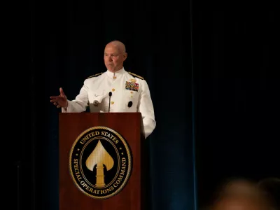 U.S. Navy Admiral Frank "Mitch" Bradley, incoming commander, U.S. Special Operations Command, delivers remarks during the USSOCOM Change of Command Ceremony in Tampa, Florida, U.S. October 3, 2025. Airman 1st Class Monique Stober/U.S. Special Operations Command/Handout via REUTERS. THIS IMAGE HAS BEEN SUPPLIED BY A THIRD PARTY