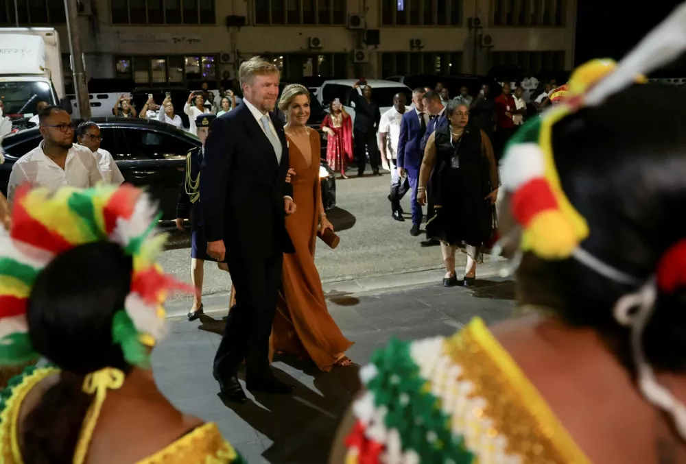 Dutch King Willem-Alexander and his wife Queen Maxima arrive for a state dinner during their official visit, in Paramaribo, Suriname, December 1, 2025. REUTERS/Ranu Abhelakh