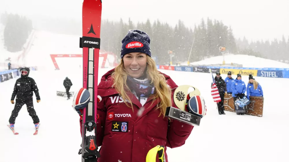 Nov 30, 2025; Copper, Colorado, USA;  Mikaela Shiffrin of the United States celebrates after winning the women's slalom alpine skiing race at the Stifel Copper Cup at Copper Mountain. Mandatory Credit: Michael Madrid-Imagn Images