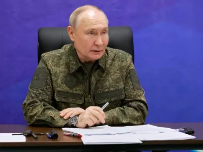 In this photo taken from video provided by Russian Presidential Press Service on Monday, Dec. 1, 2025, Russian President Vladimir Putin speaks as he visits one of the command posts of the Joint Group of the Russian Forces. in an undisclosed location. (Russian Presidential Press Service via AP)