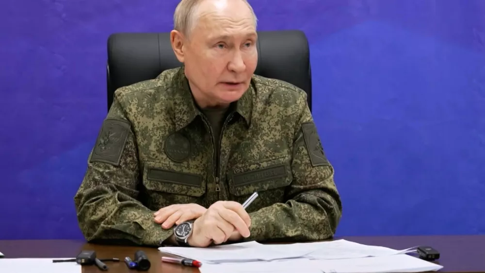 In this photo taken from video provided by Russian Presidential Press Service on Monday, Dec. 1, 2025, Russian President Vladimir Putin speaks as he visits one of the command posts of the Joint Group of the Russian Forces. in an undisclosed location. (Russian Presidential Press Service via AP)
