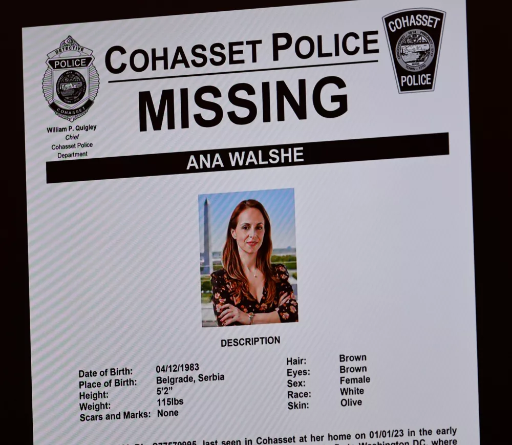 A missing person poster that the Cohasset Police produced while searching for Ana Walshe shown on the first day of the Brian Walshe murder trial in Norfolk Superior Court, Monday, Dec. 1, 2025, in Dedham, Mass. (Greg Derr/The Patriot Ledger via AP, Pool)