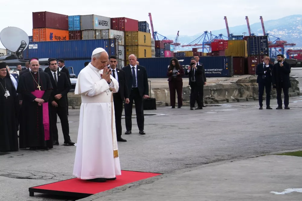 Pope Leo XIV holds a moment of prayer at the site of the 2020 Beirut port explosion in Beirut, Lebanon, Tuesday, Dec. 2, 2025. (AP Photo/Domenico Stinellis)